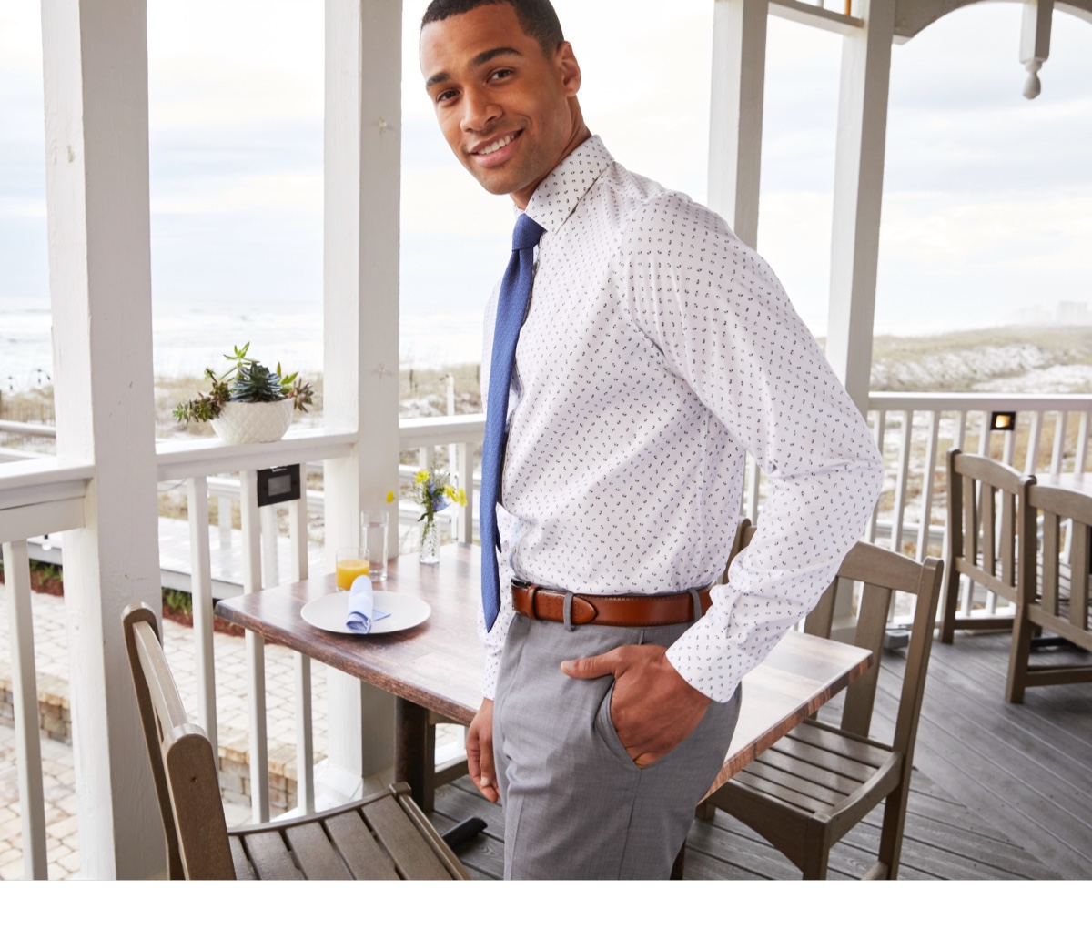 man in white dress shirt and blue tie