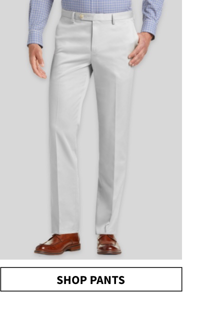 half of man wearing white pants Shop Pants