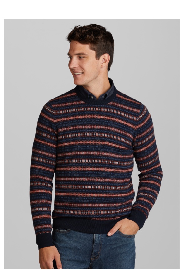 man in black and orange striped sweater