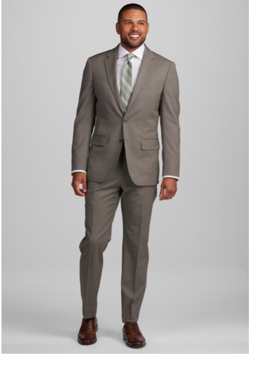 man in taupe suit