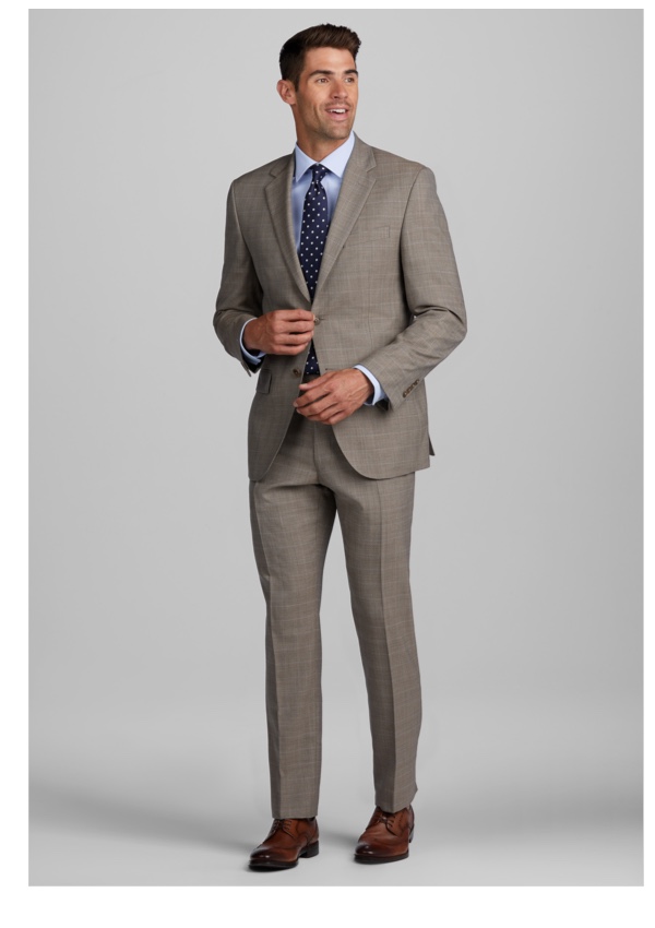 man in taupe suit